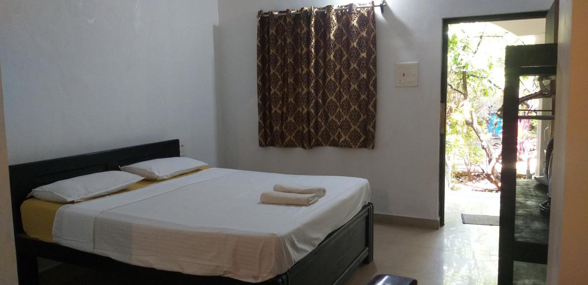 God'S Gift Morjim Hotel Bilik gambar